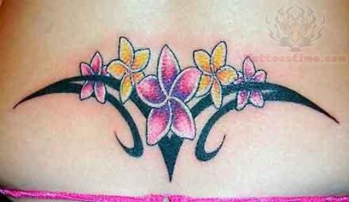 Color Flowers And Tribal Tattoo On Lowerback
